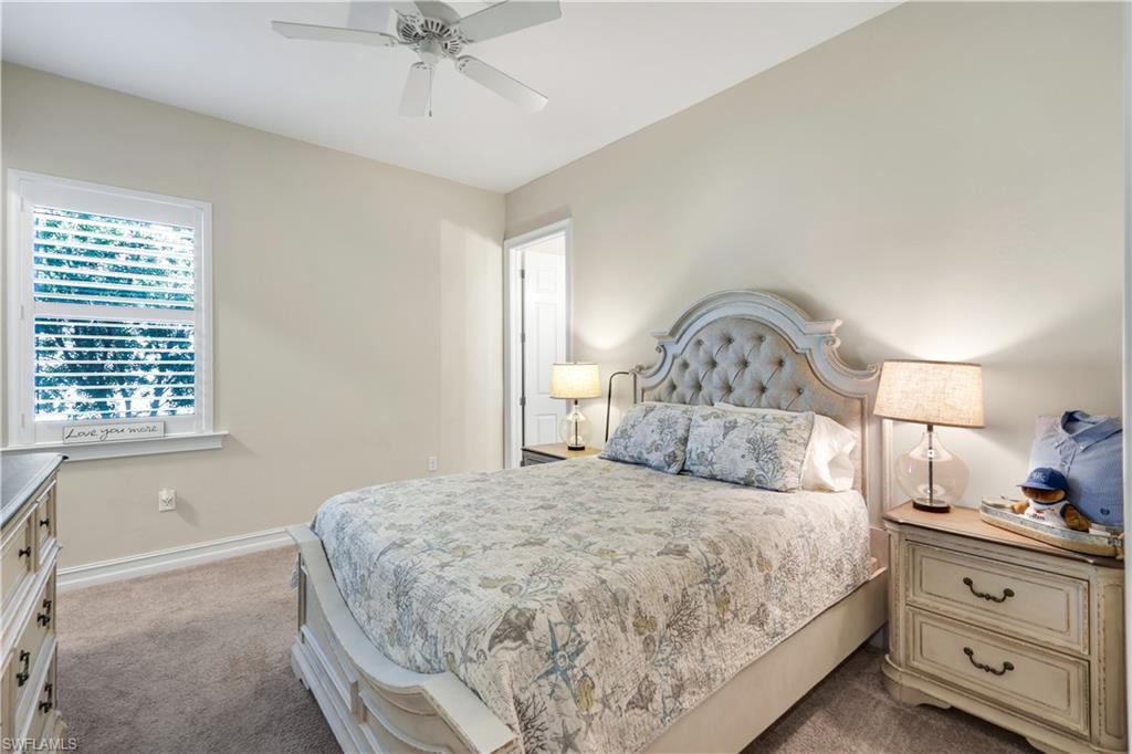 1456 Mockingbird Drive Naples, FL 34120 - Photo 24 of 43 Bedroom featuring dark carpet and ceiling fan