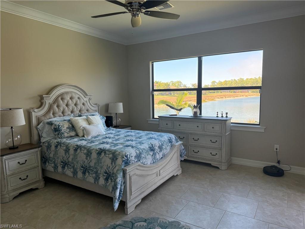 1456 Mockingbird Drive Naples, FL 34120 - Photo 27 of 43 3rd Bedroom with ornamental molding, ceiling fan, a water view, and light tile patterned flooring