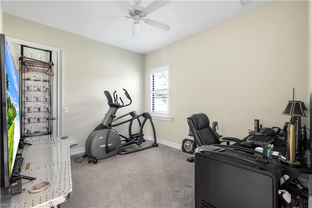 1456 Mockingbird Drive Naples, FL 34120 - Photo 32 of 43 a view of a room with gym equipment