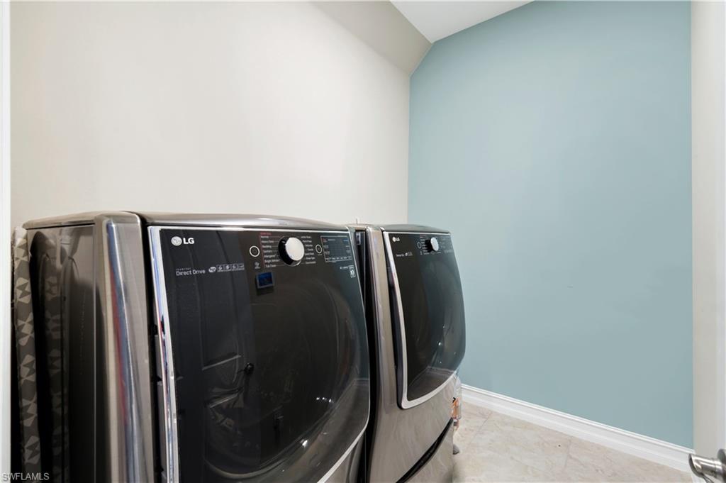 1456 Mockingbird Drive Naples, FL 34120 - Photo 33 of 43 a close up of a washer and dryer