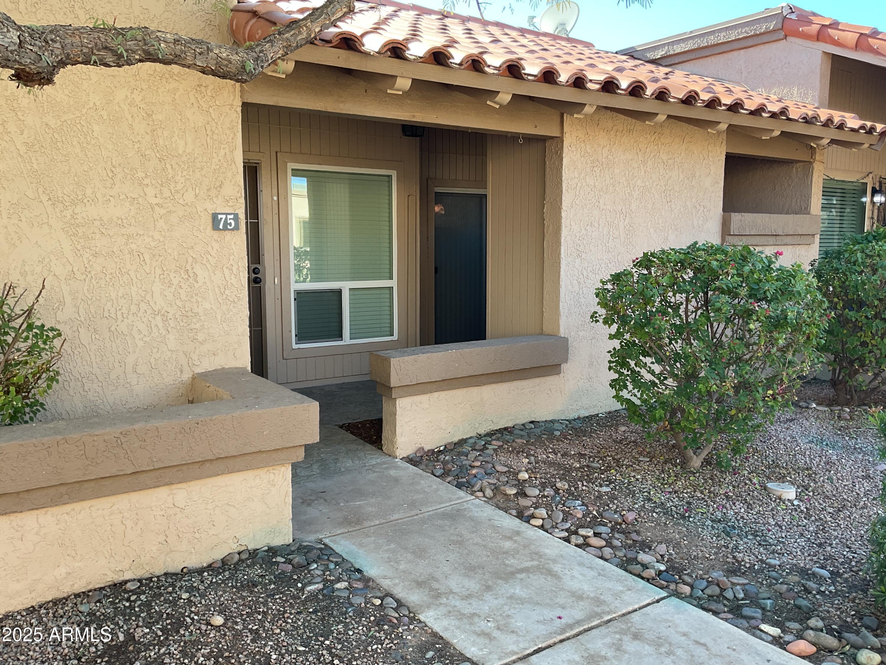 95 North Cooper Road, Unit 75 Chandler, AZ 85225 - Photo 1 of 19 a house with a outdoor space