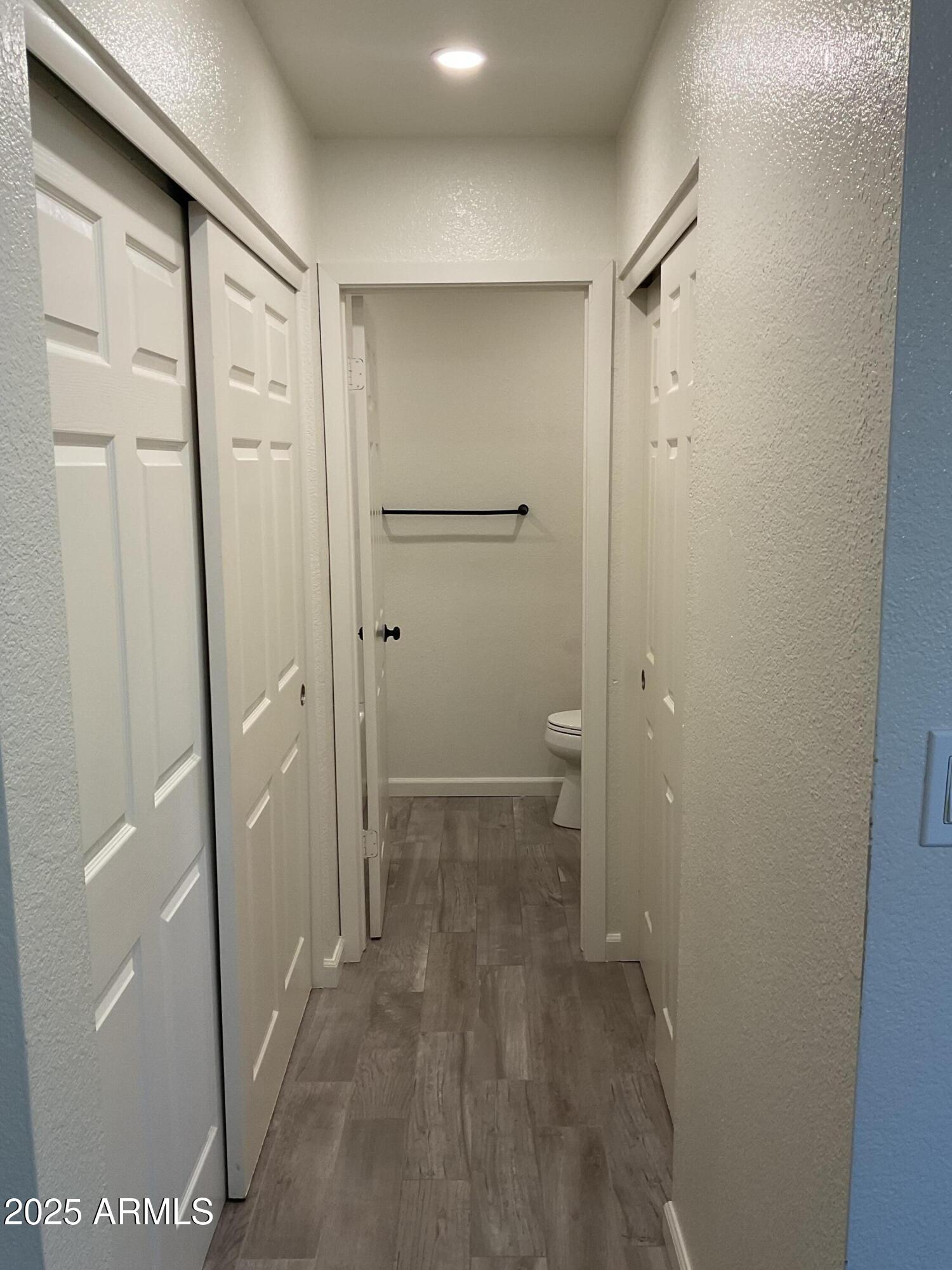 95 North Cooper Road, Unit 75 Chandler, AZ 85225 - Photo 14 of 19 a bathroom with a shower and a glass door