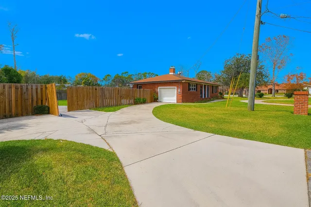 a view of a backyard with a garden