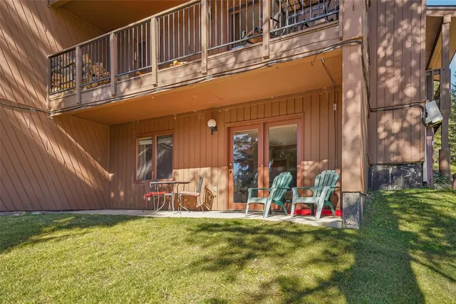 a view of a house with basketball court