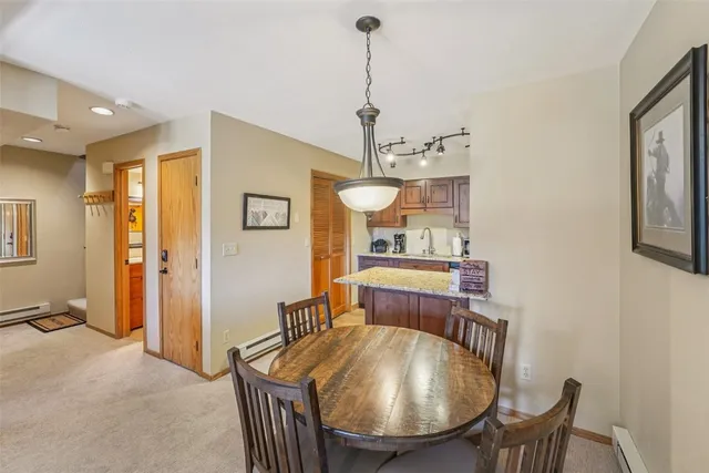 a view of a dining room with furniture