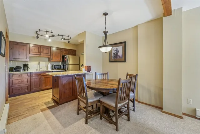 a view of a dining room with furniture