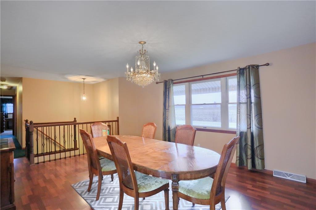 3305 State Road New Castle, PA 16105 - Photo 16 of 35 a view of a dining room with furniture a chandelier and wooden floor