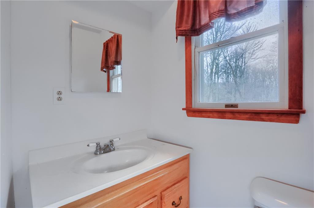 3305 State Road New Castle, PA 16105 - Photo 22 of 35 a bathroom with a sink and a mirror