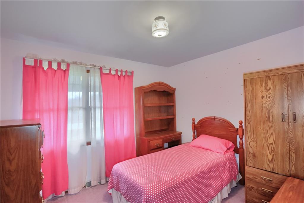 3305 State Road New Castle, PA 16105 - Photo 29 of 35 a bedroom with a bed and a closet