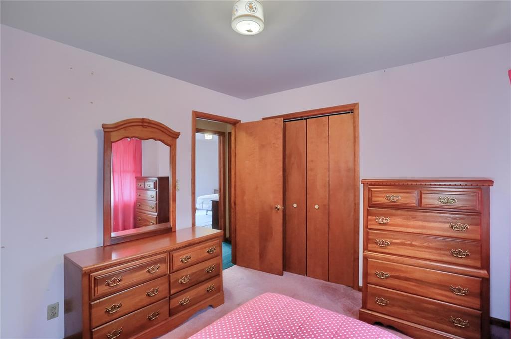 3305 State Road New Castle, PA 16105 - Photo 30 of 35 a bedroom with a bed and a dresser