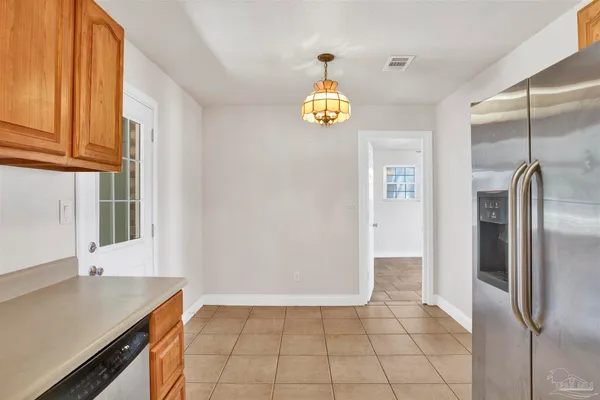 a view of a kitchen with a sink