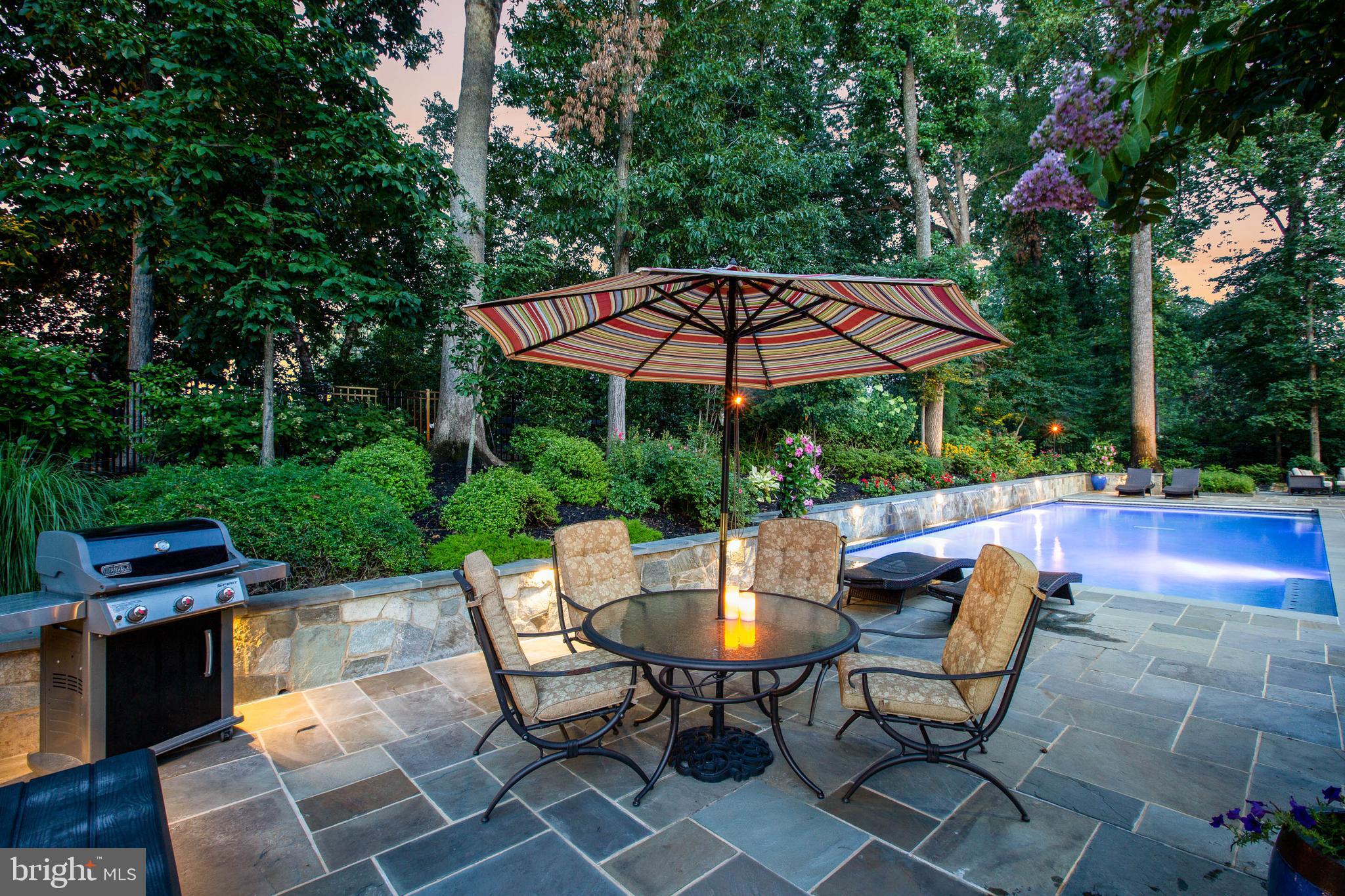 3003 Weber Place Oakton, VA 22124 - Photo 33 of 63 a view of a backyard with sitting area and furniture