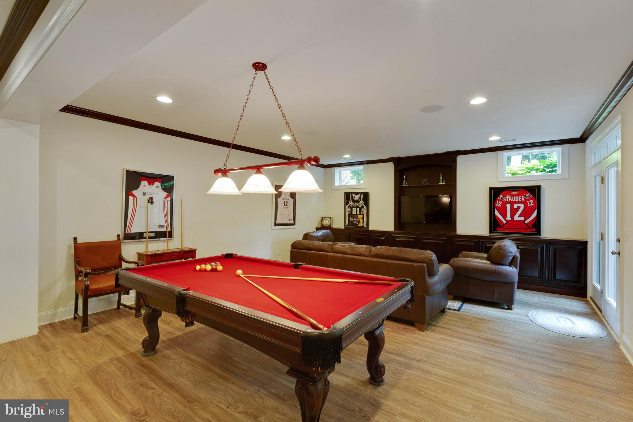 3003 Weber Place Oakton, VA 22124 - Photo 55 of 63 a living room with furniture pool table and a wooden floor