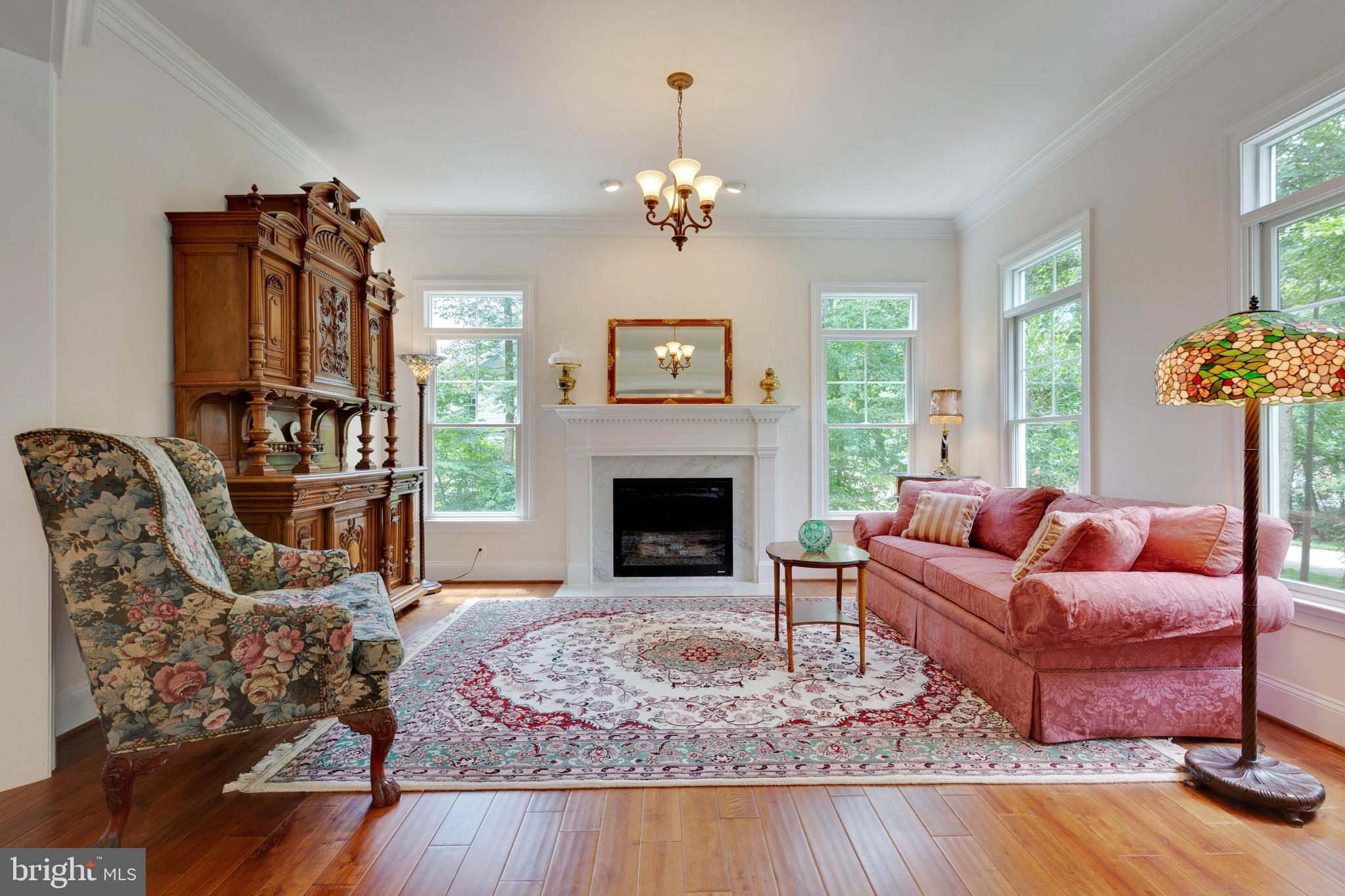 3003 Weber Place Oakton, VA 22124 - Photo 7 of 63 a living room with furniture and a fireplace