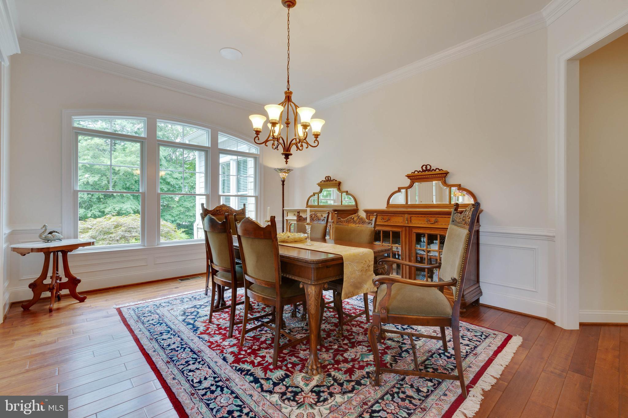 3003 Weber Place Oakton, VA 22124 - Photo 9 of 63 a view of a dining room with furniture window and wooden floor