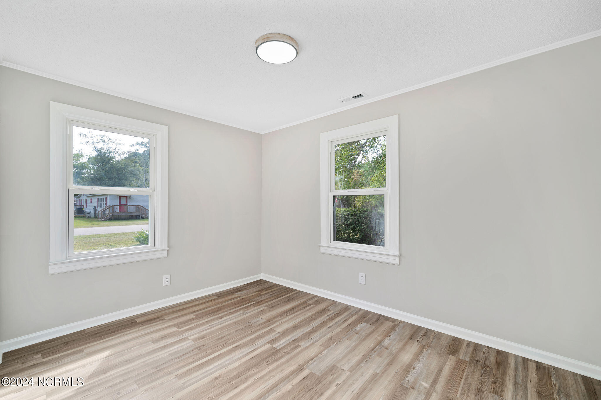 112 Pool Road Rose Hill, NC 28458 - Photo 19 of 26 Back bedroom from the left