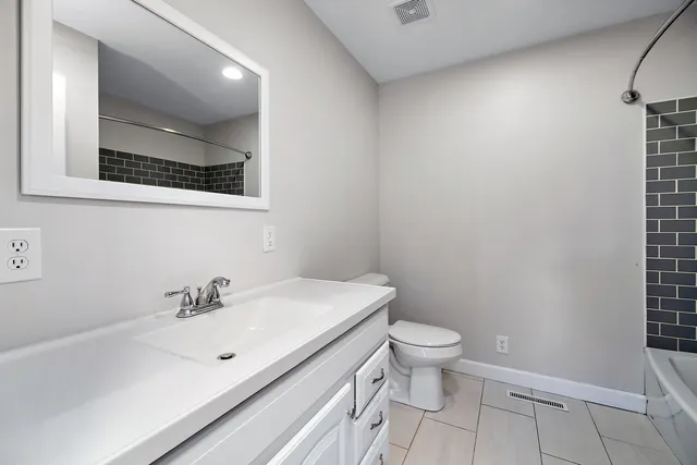 a bathroom with a sink and a toilet