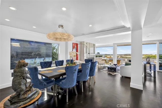 a view of a house with sitting area and garden