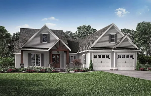 front view of a house with a yard