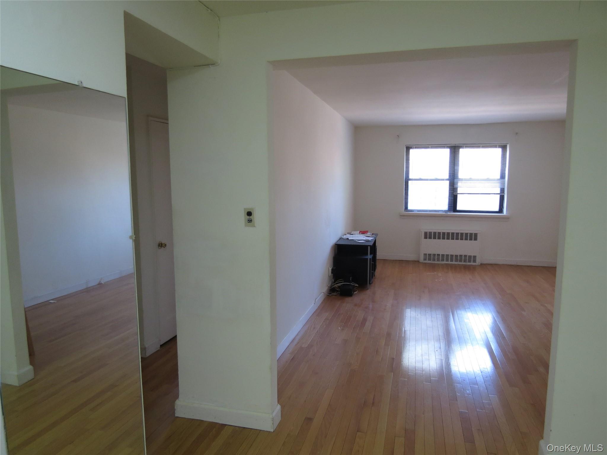 147-14 84th Road, Unit 2A Queens, NY 11435 - Photo 7 of 36 Living Room View From Foyer Entry