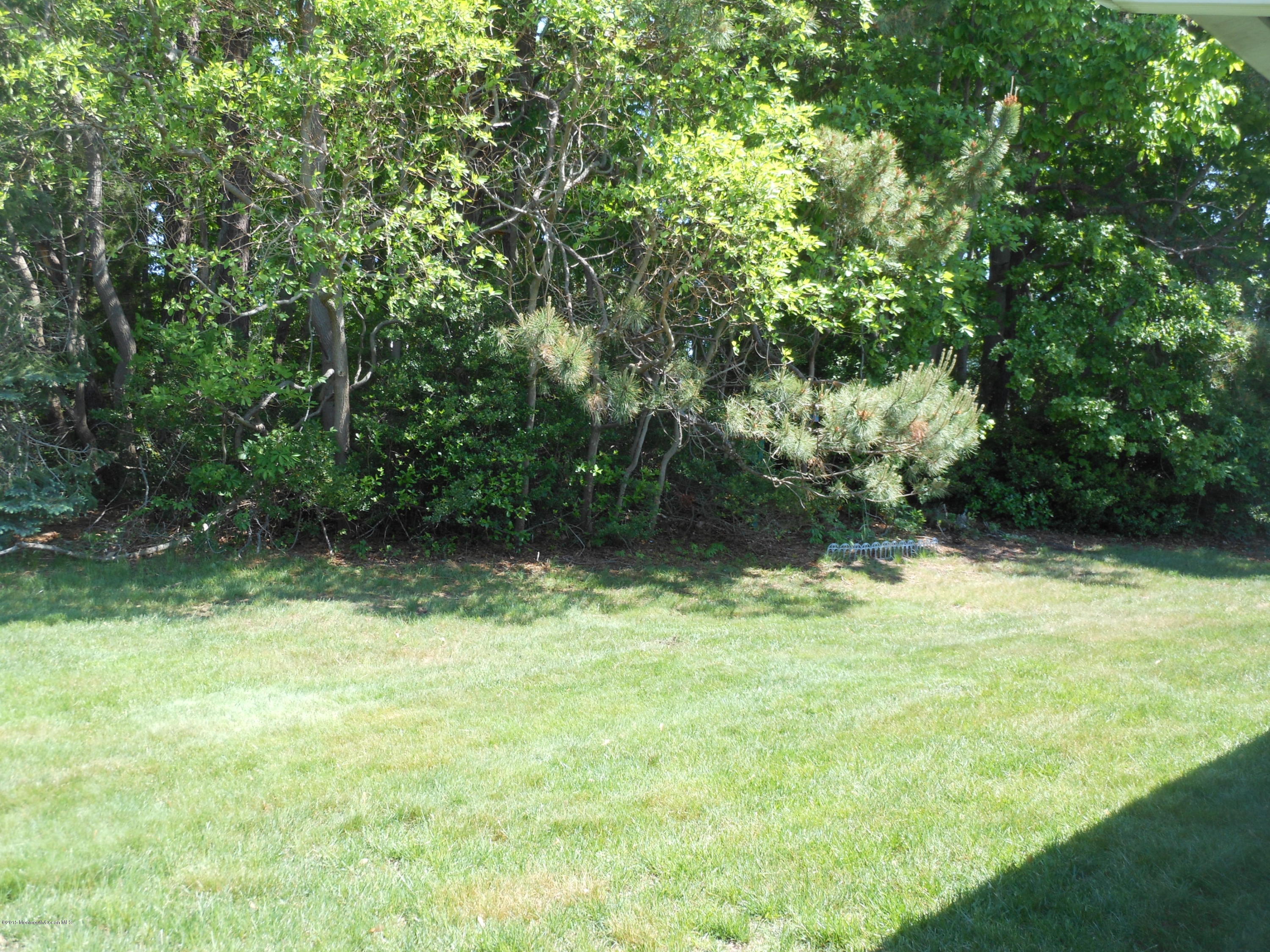 14 Phillips Road Brick, NJ 08724 - Photo 3 of 21 a backyard of a house with lots of green space