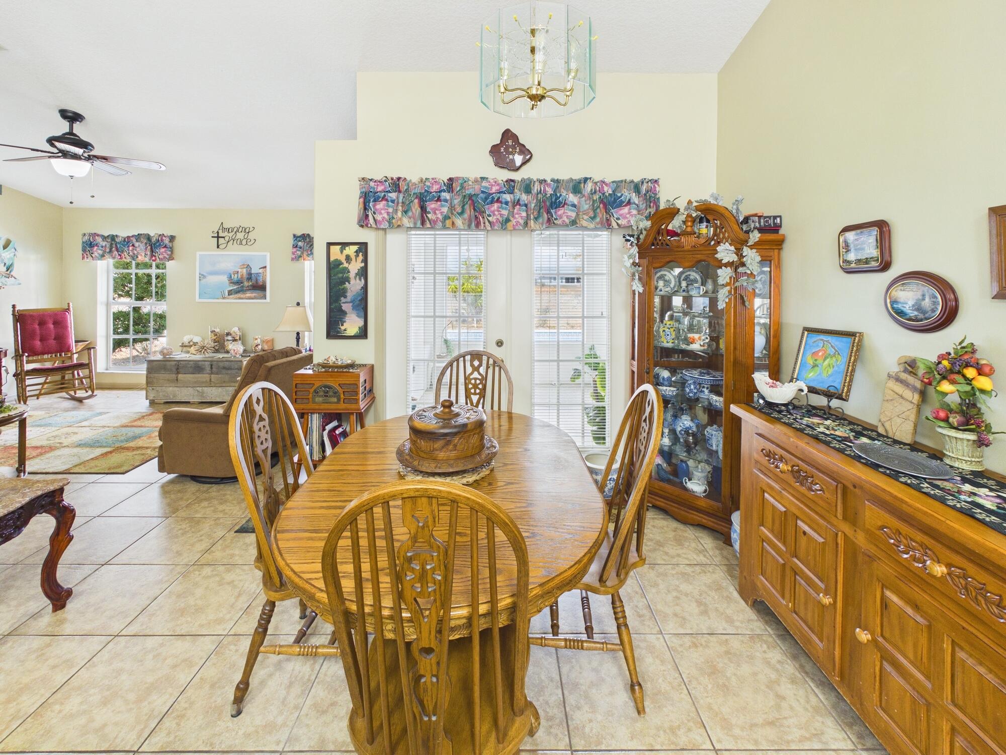 8525 Southwest 9th Street Okeechobee, FL 34974 - Photo 21 of 67 a view of a dining room with furniture