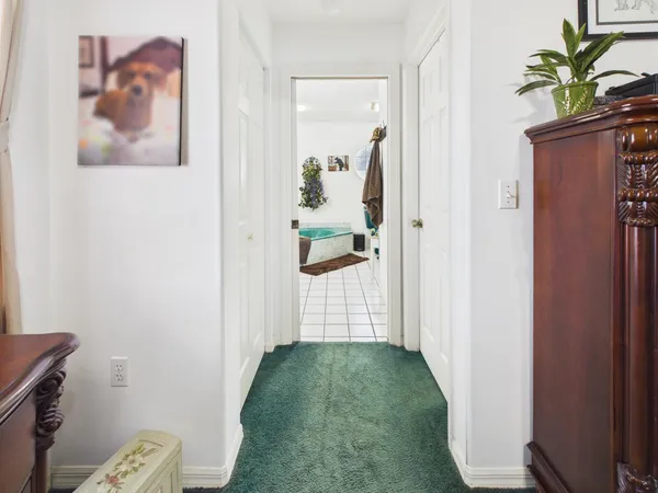 a bathroom with a sink double vanity and a mirror