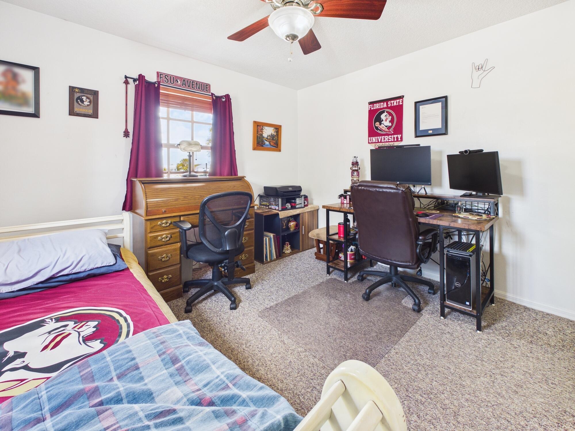 8525 Southwest 9th Street Okeechobee, FL 34974 - Photo 53 of 67 a view of a workspace with furniture and a workspace