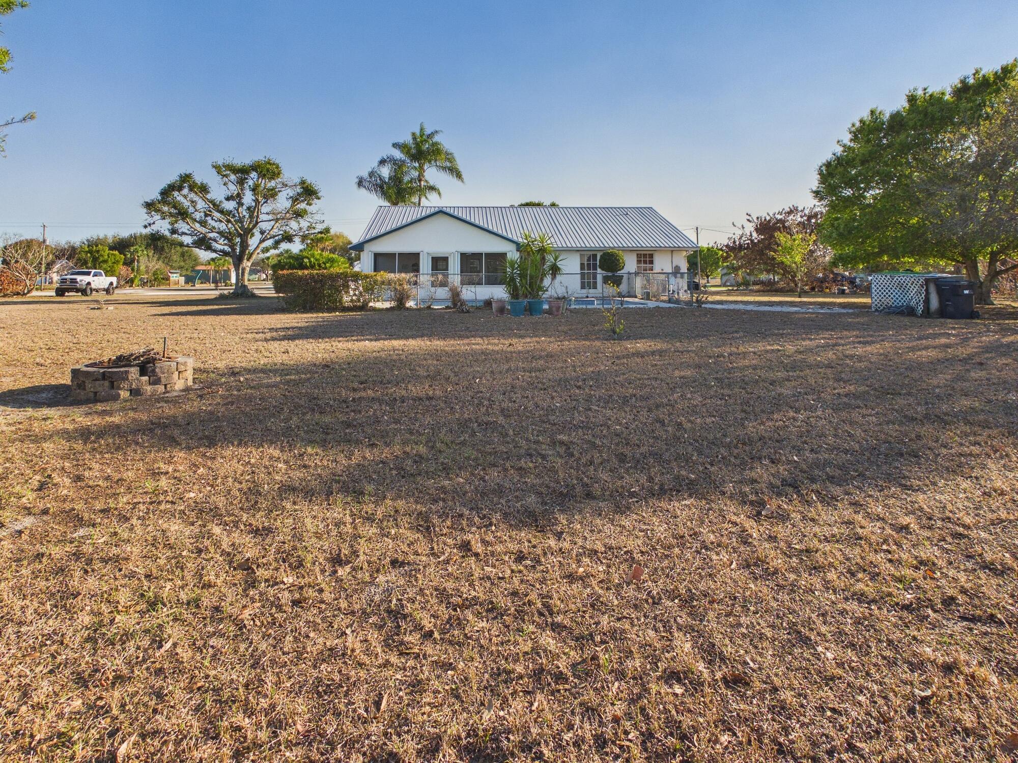 8525 Southwest 9th Street Okeechobee, FL 34974 - Photo 58 of 67 a view of house with outdoor space