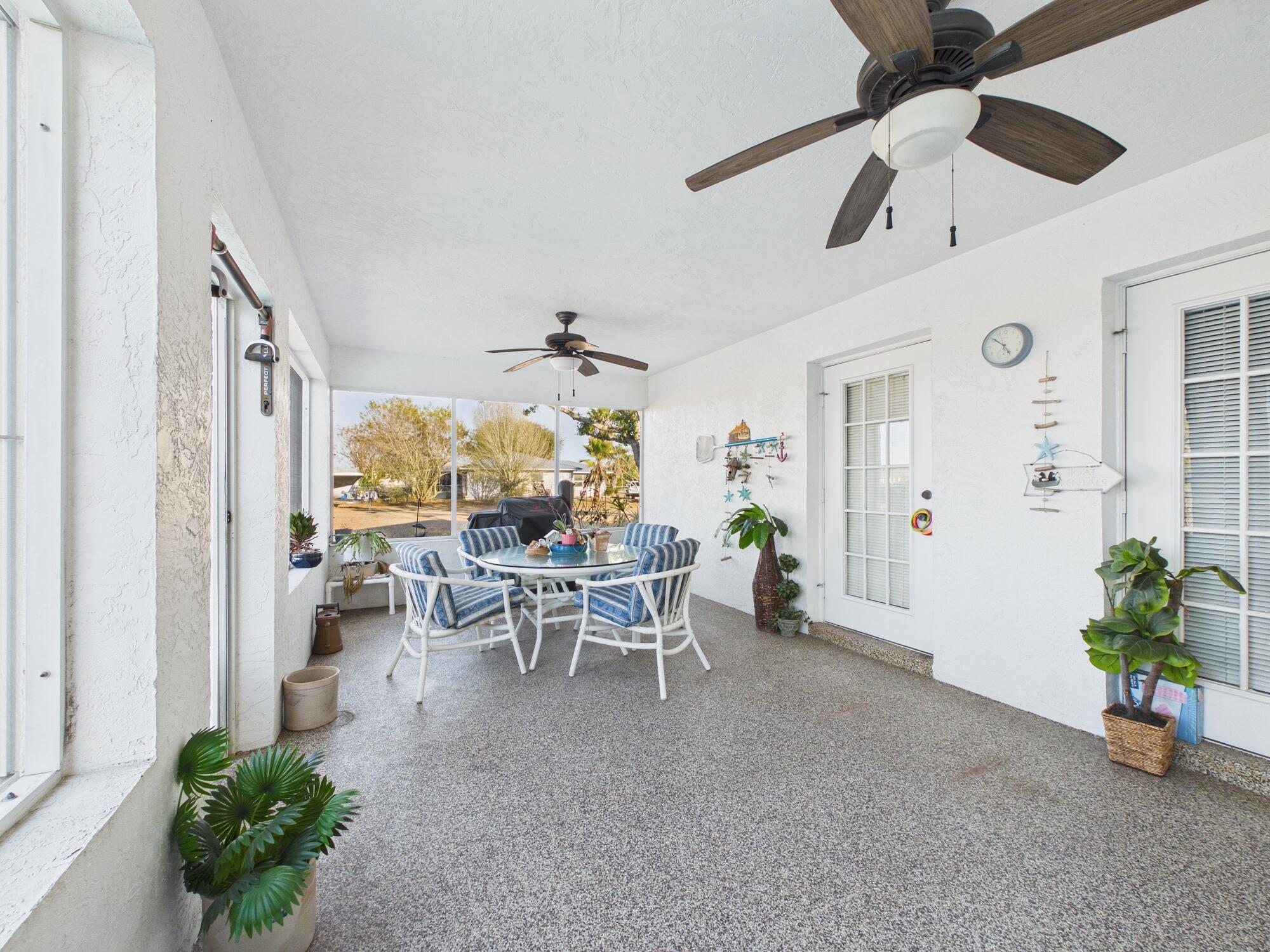 8525 Southwest 9th Street Okeechobee, FL 34974 - Photo 62 of 67 a view of a livingroom with furniture and a window