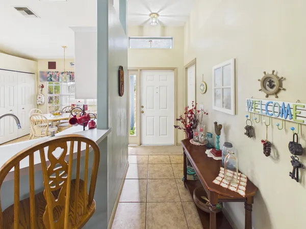 a kitchen with stainless steel appliances kitchen island granite countertop a sink and cabinets