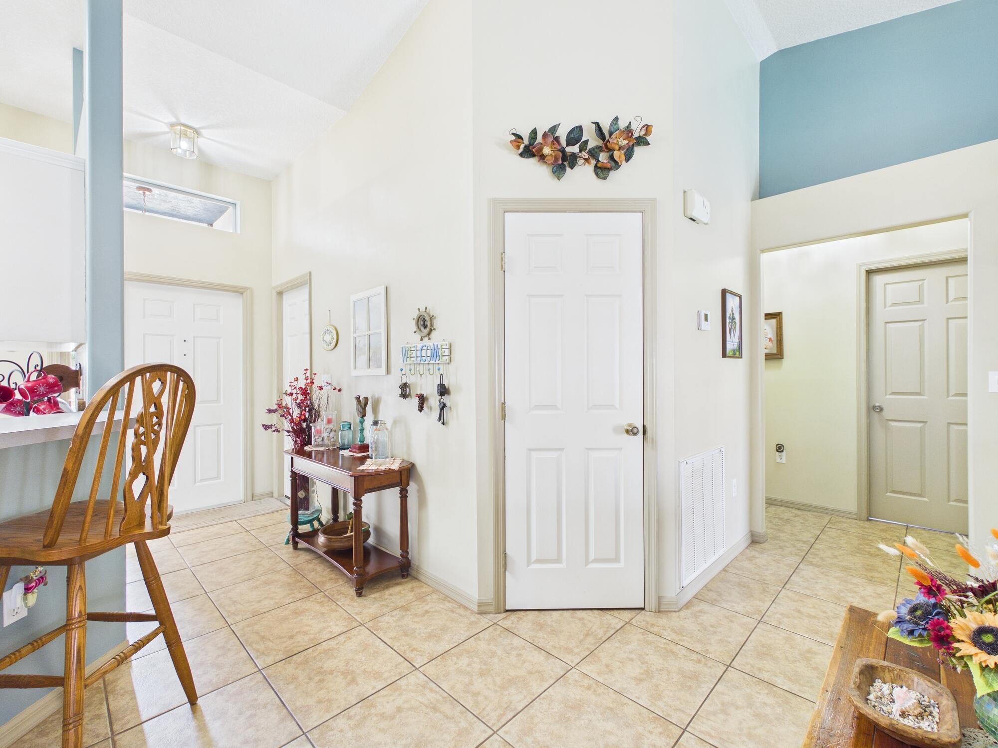8525 Southwest 9th Street Okeechobee, FL 34974 - Photo 8 of 67 a view of a workspace with furniture and toys