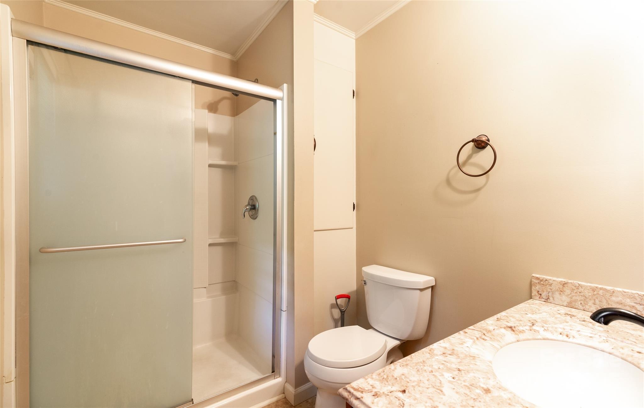 220 Frosty Ridge Road Sylva, NC 28779 - Photo 10 of 32 a bathroom with a toilet and a shower