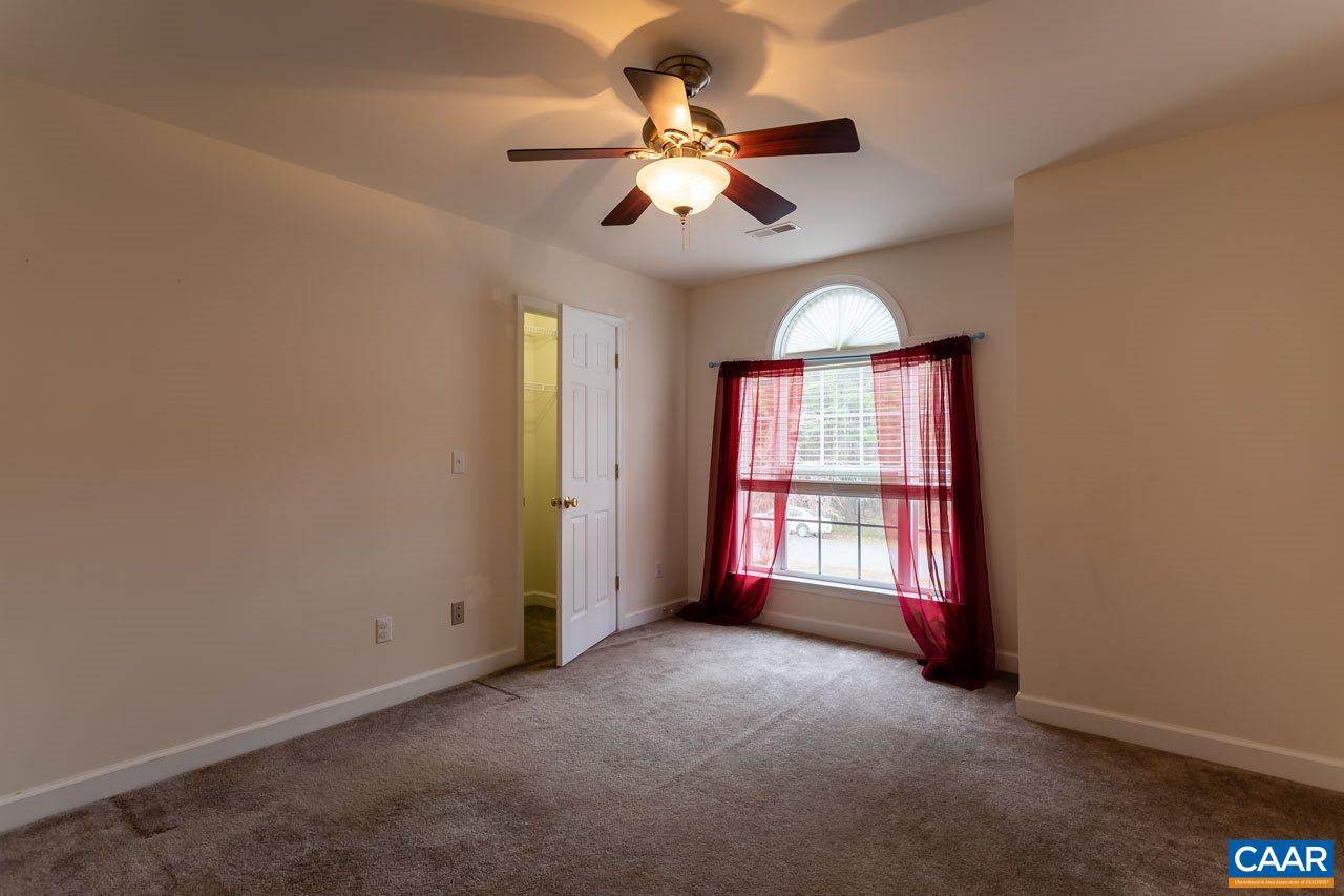 25 Haversack Road Palmyra, VA 22963 - Photo 24 of 42 an empty room with chandelier fan