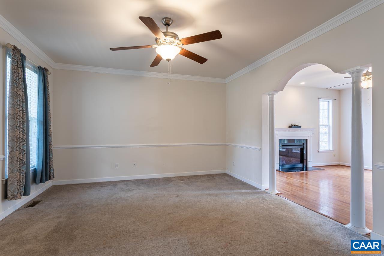 25 Haversack Road Palmyra, VA 22963 - Photo 6 of 42 an empty room with a empty space and a ceiling fan