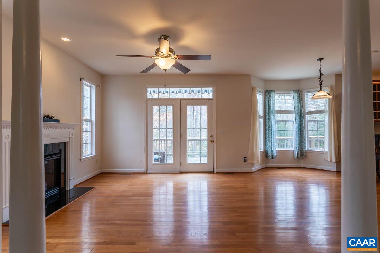 25 Haversack Road Palmyra, VA 22963 - Photo 7 of 42 a view of an empty room with wooden floor and a window