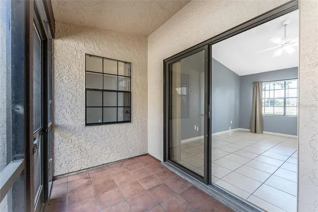 a view of an empty room and window