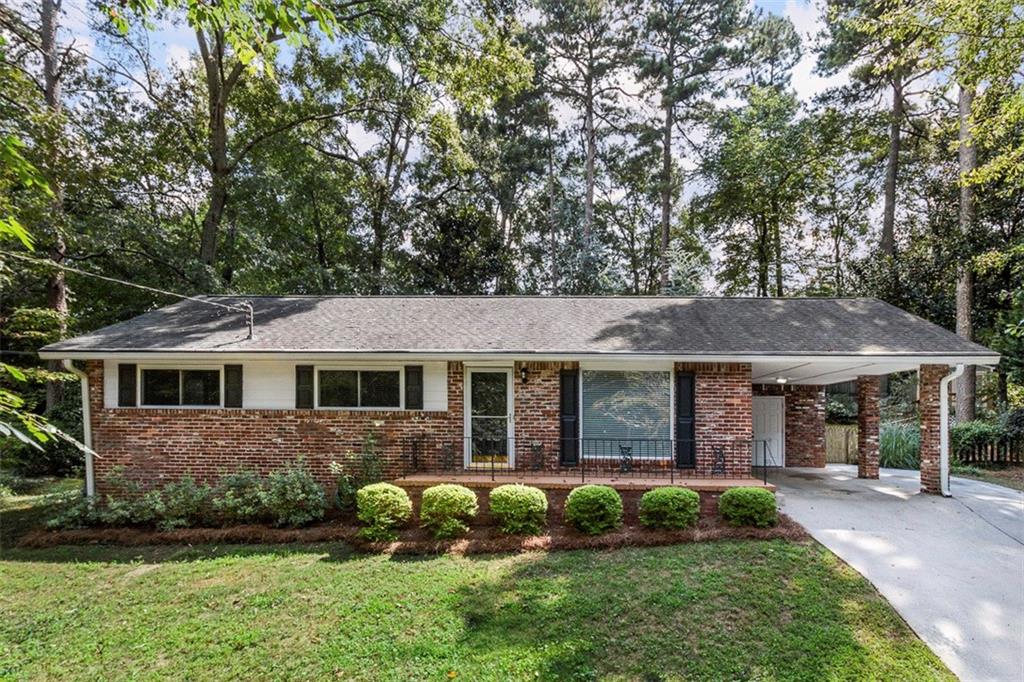 2971 Atterberry Court Decatur, GA 30033 - Photo 1 of 1 a front view of a house with garden