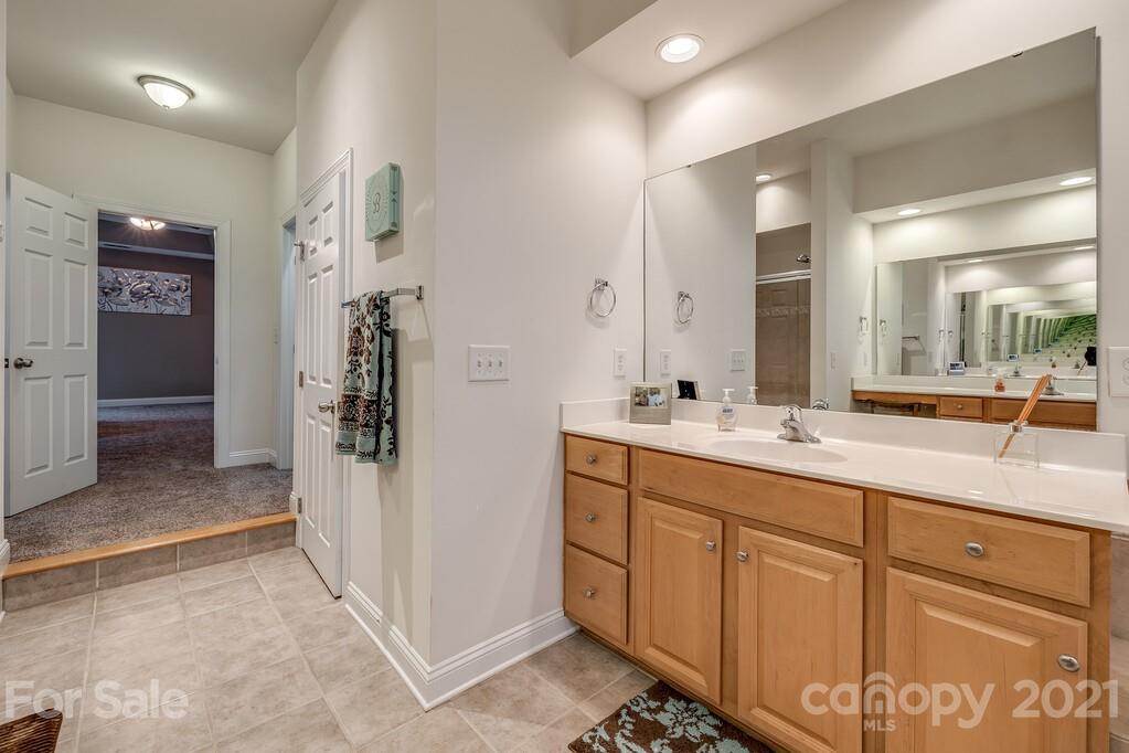 415 Fischer Road Fort Mill, SC 29715 - Photo 25 of 48 a bathroom with a double vanity sink and a mirror