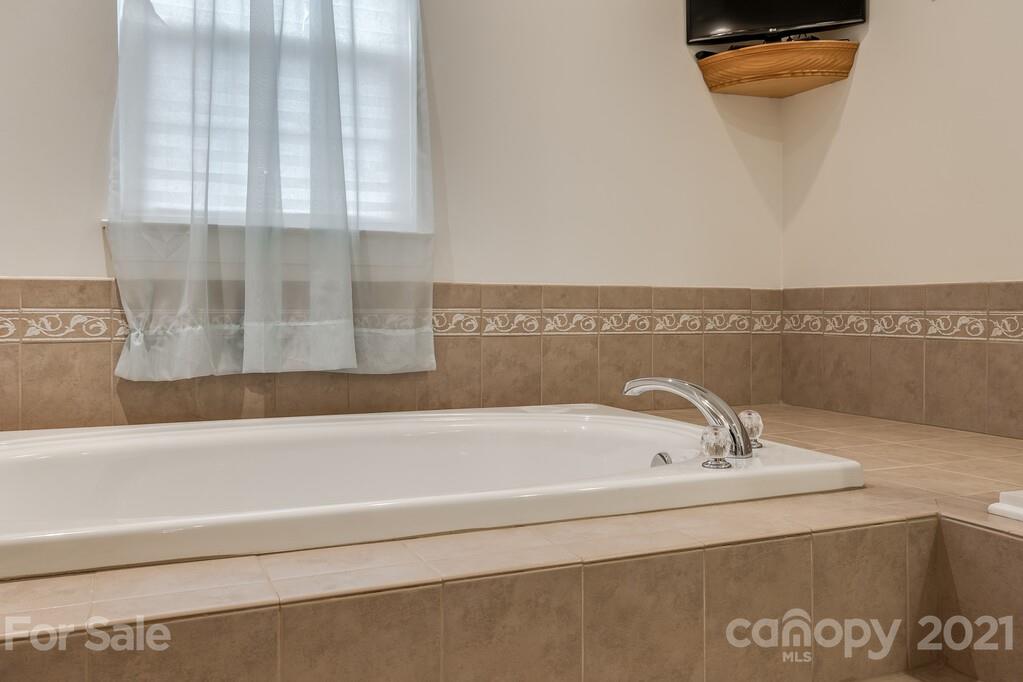 415 Fischer Road Fort Mill, SC 29715 - Photo 27 of 48 a bathroom with a bathtub
