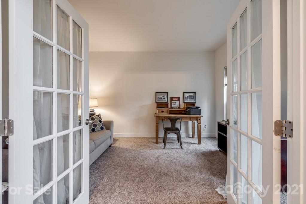 415 Fischer Road Fort Mill, SC 29715 - Photo 4 of 48 a view of a workspace with furniture and a window