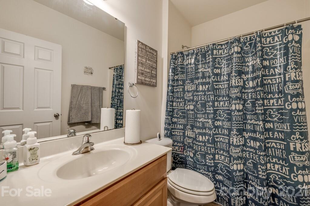 415 Fischer Road Fort Mill, SC 29715 - Photo 35 of 48 a bathroom with a sink toilet and shower