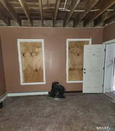 a view of livingroom with a large window