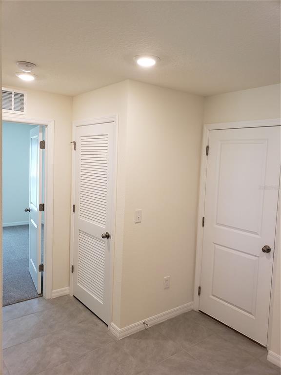 12211 Kingsley Trail Parrish, FL 34219 - Photo 5 of 28 an empty room with closet area