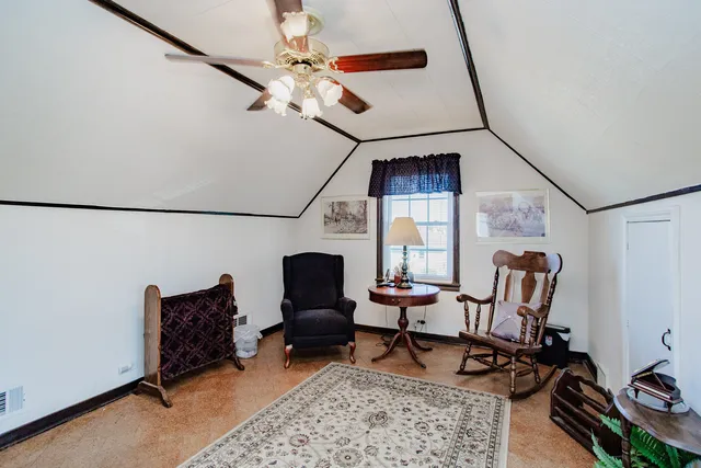 a workspace with furniture and a window