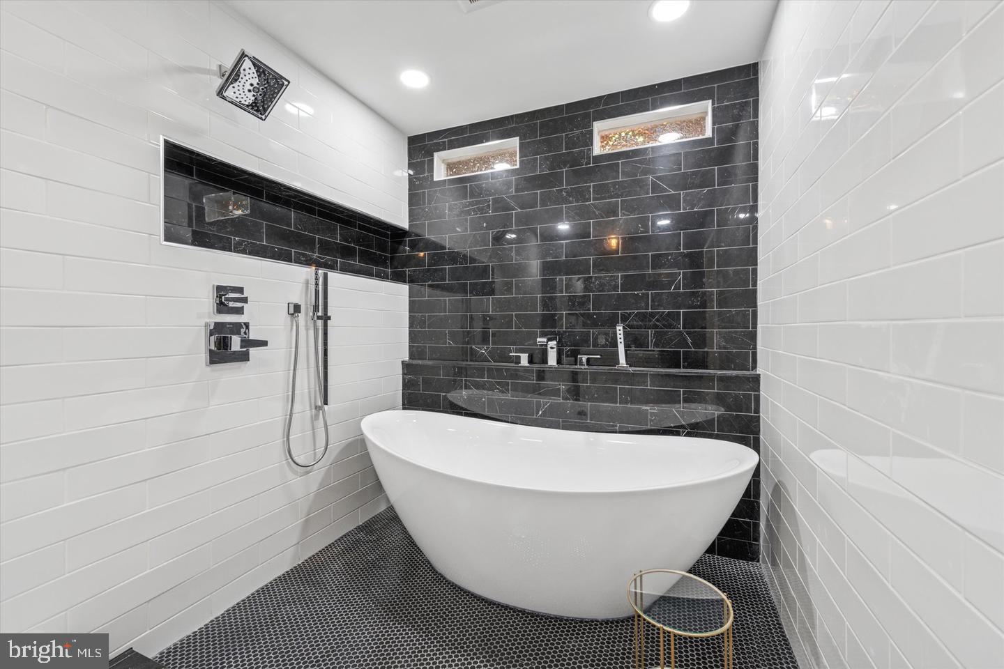 635 North 13th Street, Unit A Philadelphia, PA 19123 - Photo 15 of 17 a bathroom with a bathtub and shower