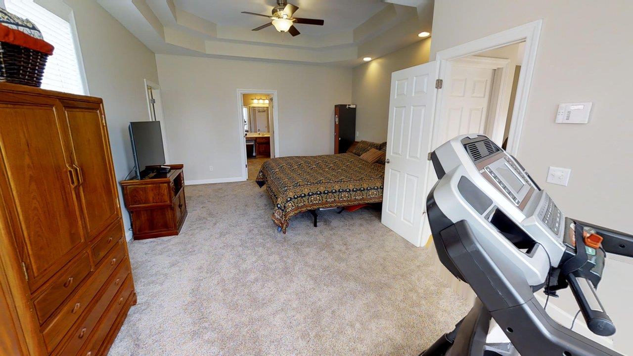919 Sam Johnson Road Columbia, TN 38401 - Photo 11 of 29 a living room with furniture and a flat screen tv