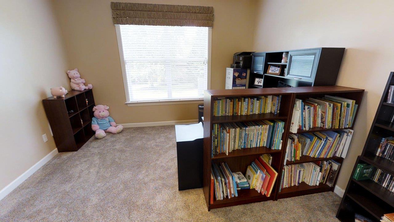 919 Sam Johnson Road Columbia, TN 38401 - Photo 13 of 29 a view of room with furniture and book shelf
