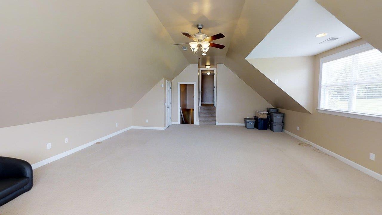 919 Sam Johnson Road Columbia, TN 38401 - Photo 20 of 29 en empty room with windows and ceiling fan