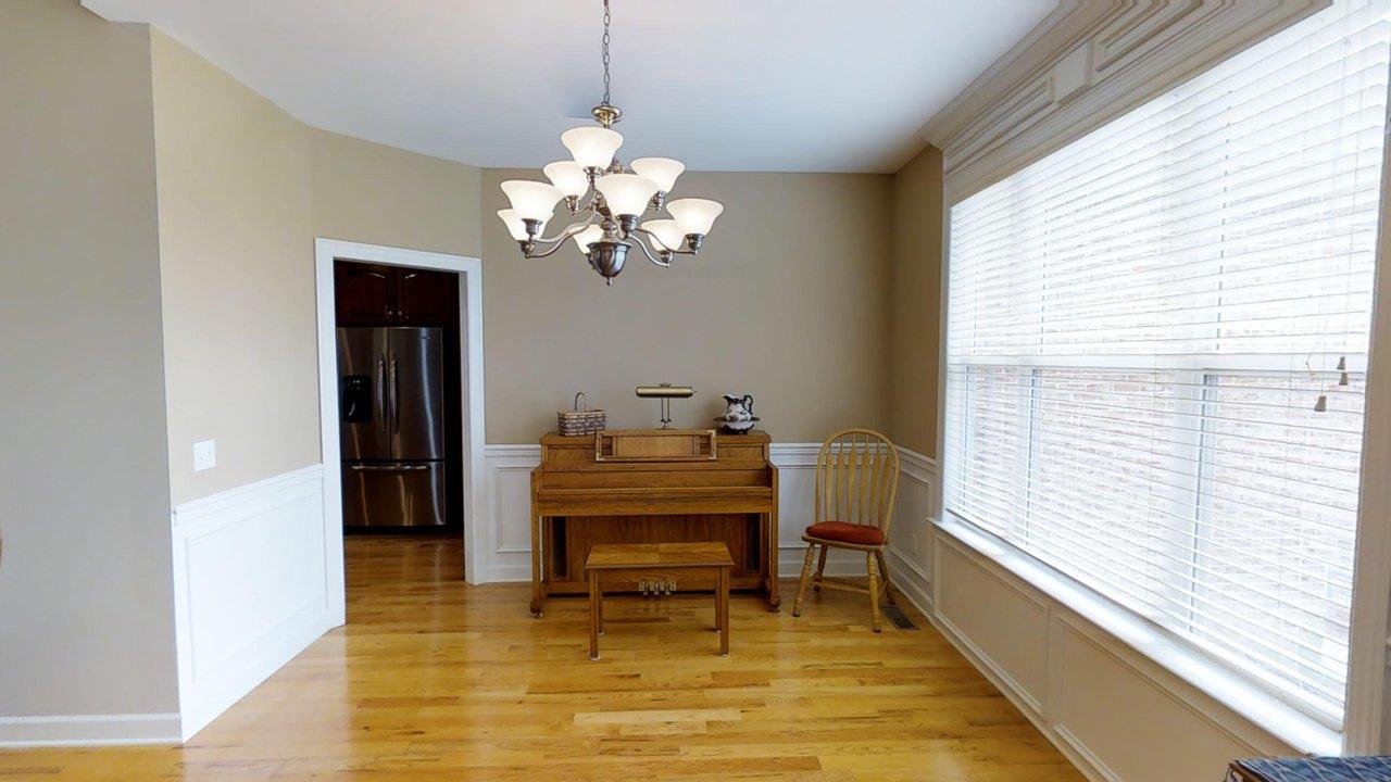 919 Sam Johnson Road Columbia, TN 38401 - Photo 3 of 29 a view of a dining room with furniture and chandelier